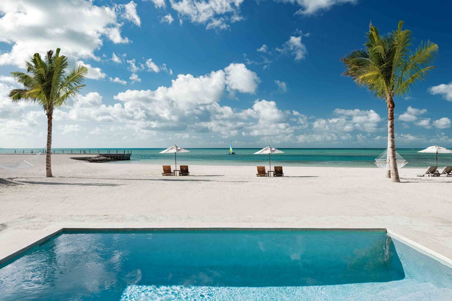Exclusivo Viaje Fin de Año Ambergris Cay Turcas diseñado por LAT.40