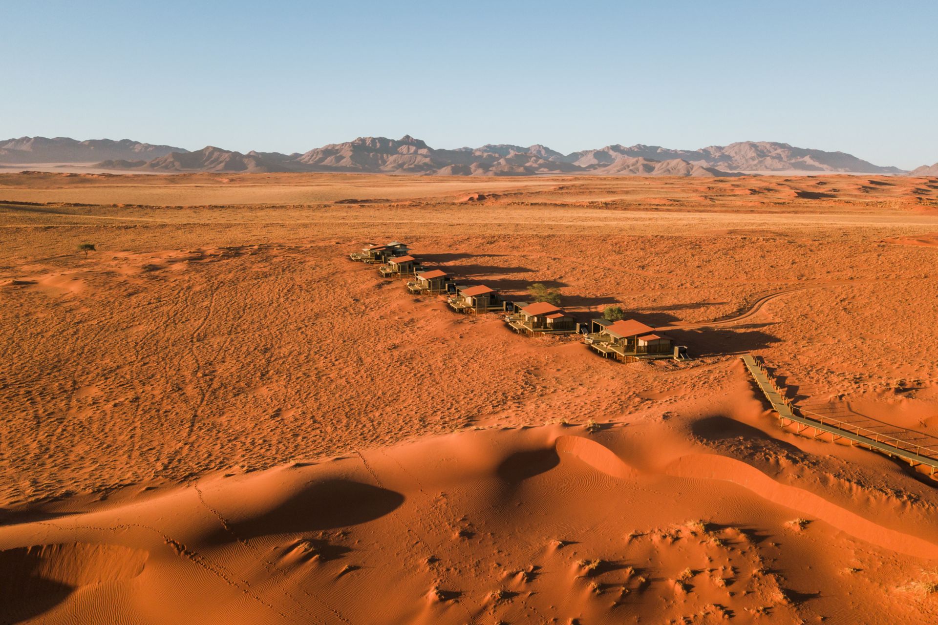 Wolwedans collection desert lodge aerials blending into orange sands 2